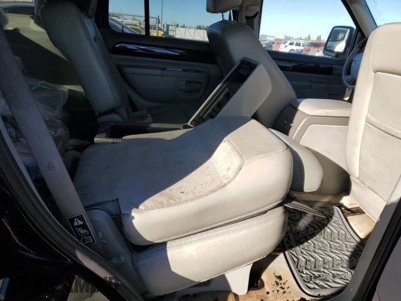 2003 Lincoln Aviator Premium z VIN 5LMEU78H63ZJ21718, wystawiony jako Copart lot #89216575 z przebiegiem 182 697 mil mil oraz Szkoda całkowita • Salvage title. Historia ofert i sprzedaży dostępna na DreamBid. Obrazek 11.
