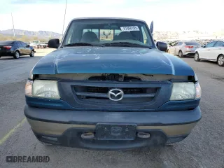 1999 Mazda B-Series 4WD Truck SE with VIN 4F4ZR17X7XTM38701, listed as a Copart auction lot 47068185 with 193,974 mi miles and Salvage Title. Bid and sale history available at carsss.com. Image 5.