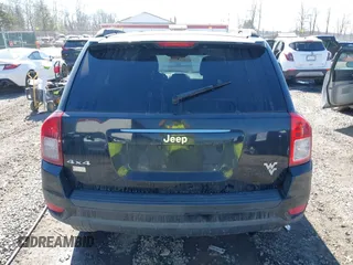 2014 Jeep Compass Sport with VIN 1C4NJDBB0ED567592, listed as a IAAI auction lot 41696070 with 150,303 mi miles. Bid and sale history available at carsss.com. Image 16.