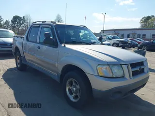 2004 Ford Explorer Sport Trac XLS z VIN 1FMZU77K74UA28903, wystawiony jako IAAI lot #41891563 z przebiegiem 186 399 mil mil oraz . Historia ofert i sprzedaży dostępna na DreamBid. Obrazek 1.