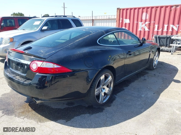2009 Jaguar XK with VIN SAJWA43B295B31026, listed as a IAAI auction lot 41950751 with 110,331 mi miles. Bid and sale history available at carsss.com. Image 4.
