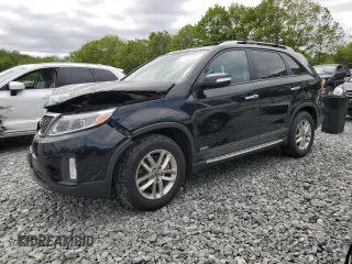 2015 Kia Sorento LX z VIN 5XYKTDA63FG594340, wystawiony jako Copart lot #57444205 z przebiegiem 127 793 mil mil oraz Czysty tytuł • Clean title. Historia ofert i sprzedaży dostępna na DreamBid. Obrazek 1.
