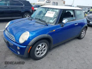 2005 MINI Hardtop with VIN WMWRC33585TJ69273, listed as a IAAI auction lot 42041797 with 150,983 mi miles and . Bid and sale history available at DreamBid. Image 2.