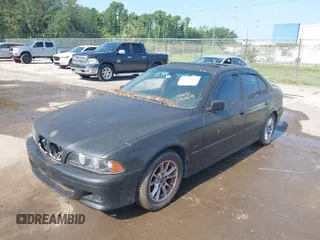 2000 BMW 5 Series 528i z VIN WBADM6348YGU16191, wystawiony jako IAAI lot #42295709 z przebiegiem 208 067 mil mil oraz . Historia ofert i sprzedaży dostępna na DreamBid. Obrazek 2.