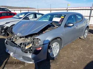 2014 Dodge Avenger SE with VIN 1C3CDZAB7EN144102, listed as a IAAI auction lot 41635691 with 201,428 mi miles and . Bid and sale history available at DreamBid. Image 17.