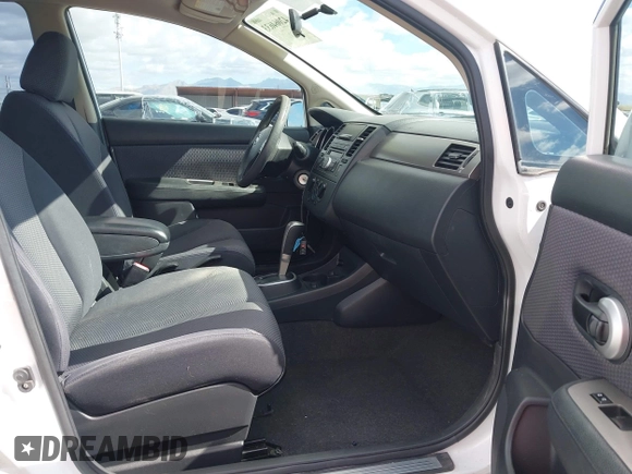2009 Nissan Versa 1.8 S with VIN 3N1BC13E19L371006, listed as a IAAI auction lot 42064633 with 67,424 mi miles. Bid and sale history available at carsss.com. Image 5.
