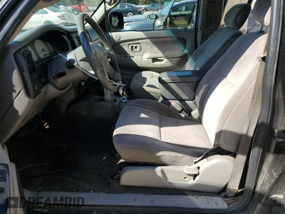 2003 Toyota Tacoma PreRunner z VIN 5TEGM92N43Z281269, wystawiony jako Copart lot #77200284 z przebiegiem 279 039 mil mil oraz Szkoda całkowita • Salvage title. Historia ofert i sprzedaży dostępna na DreamBid. Obrazek 7.