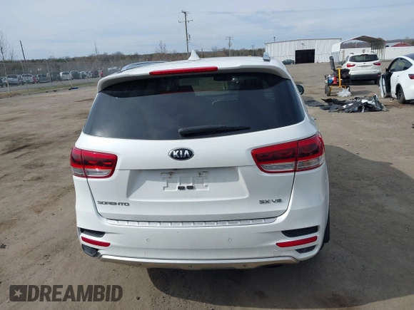 2016 Kia Sorento SX z VIN 5XYPKDA54GG101802, wystawiony jako IAAI lot #41784161 z przebiegiem 99 162 mil mil oraz . Historia ofert i sprzedaży dostępna na DreamBid. Obrazek 16.