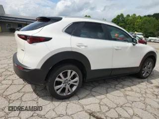 2023 Mazda CX-30 S Preferred with VIN 3MVDMBCM4PM511815, listed as a Copart auction lot 64192945 with Not provided miles and Salvage title. Bid and sale history available at DreamBid. Image 3.