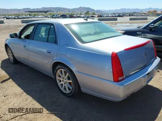 2006 Cadillac DTS w/1SE with VIN 1G6KD57956U188369, listed as a IAAI auction lot 41837341 with 115,417 mi miles. Bid and sale history available at carsss.com. Image 3.