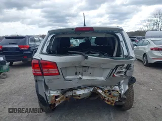 2013 Dodge Journey SE with VIN 3C4PDCAB9DT532554, listed as a IAAI auction lot 42026129 with 164,599 mi miles. Bid and sale history available at carsss.com. Image 17.