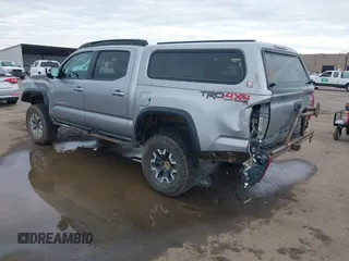 2017 Toyota Tacoma SR5 with VIN 3TMCZ5AN8HM051829, listed as a IAAI auction lot 41616329 with 64,113 mi miles and . Bid and sale history available at DreamBid. Image 3.