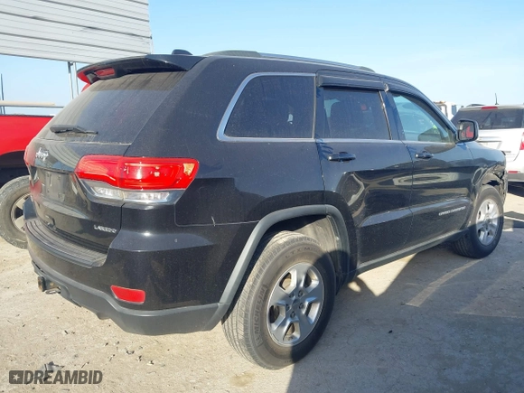 2014 Jeep Grand Cherokee Laredo with VIN 1C4RJEAG4EC136764, listed as a IAAI auction lot 41817676 with 133,943 mi miles. Bid and sale history available at carsss.com. Image 4.