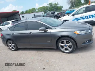 2013 Ford Fusion SE Hybrid с VIN 3FA6P0LU1DR267258, выставлен на аукционе IAAI как лот 42675187 с пробегом 184 121 миль миль и . История ставок и продаж доступна на DreamBid. Изображение 13.