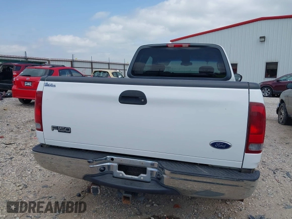 2003 Ford F-150 XL with VIN 1FTRX17L33NB79733, listed as a IAAI auction lot 42023385 with 136,236 mi miles. Bid and sale history available at carsss.com. Image 16.