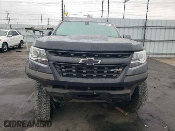 2018 Chevrolet Colorado 4WD ZR2 with VIN 1GCPTEE17J1211308, listed as a Copart auction lot 81398054 with 135,350 mi miles and Salvage Title. Bid and sale history available at carsss.com. Image 5.