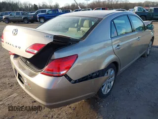 2006 Toyota Avalon XL with VIN 4T1BK36B96U125010, listed as a IAAI auction lot 41446847 with 84,984 mi miles. Bid and sale history available at carsss.com. Image 4.