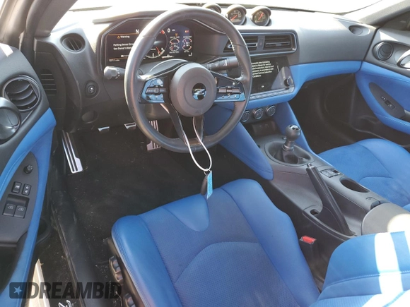 2023 Nissan Z Performance с VIN JN1BZ4BHXPM311269, выставлен на аукционе Copart как лот 75271644 с пробегом 10 711 миль миль и Списание • Salvage title. История ставок и продаж доступна на DreamBid. Изображение 8.