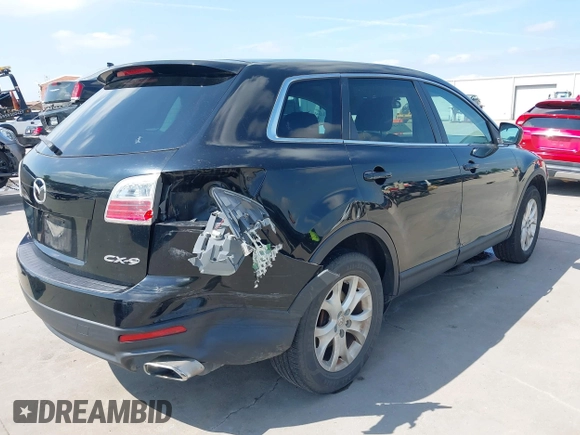 2011 Mazda CX-9 Sport with VIN JM3TB2BA7B0303120, listed as a IAAI auction lot 42427053 with 219,673 mi miles and . Bid and sale history available at DreamBid. Image 6.