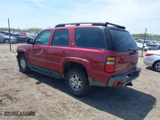 2005 Chevrolet Tahoe LT with VIN 1GNEK13T25R261555, listed as a IAAI auction lot 42060225 with 151,190 mi miles. Bid and sale history available at carsss.com. Image 3.