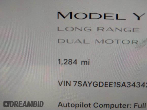 2025 Tesla Model Y Long Range with VIN 7SAYGDEE1SA343429, listed as a IAAI auction lot 41504455 with 1,284 mi miles and . Bid and sale history available at carsss.com. Image 15.