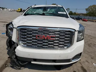 2019 GMC Yukon Denali with VIN 1GKS1CKJ7KR194428, listed as a Copart auction lot 71191064 with 56,409 mi miles and Salvage Title. Bid and sale history available at carsss.com. Image 5.