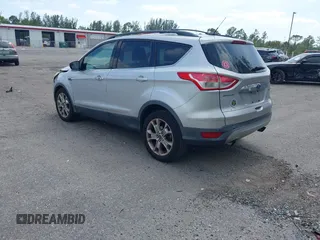 2013 Ford Escape SEL with VIN 1FMCU0H97DUD95194, listed as a IAAI auction lot 42052786 with 145,616 mi miles. Bid and sale history available at carsss.com. Image 3.