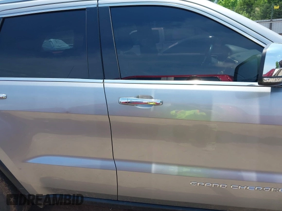 2014 Jeep Grand Cherokee Limited with VIN 1C4RJFBG4EC589321, listed as a IAAI auction lot 42335043 with 153,428 mi miles and . Bid and sale history available at DreamBid. Image 14.