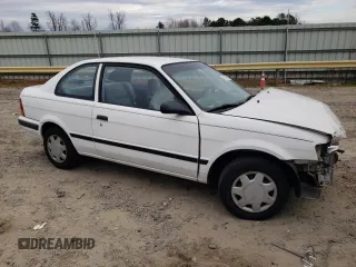1995 Toyota Tercel DX z VIN JT2EL56D9S0074954, wystawiony jako Copart lot #82666514 z przebiegiem 96 300 mil mil oraz Szkoda całkowita • Salvage title. Historia ofert i sprzedaży dostępna na DreamBid. Obrazek 4.