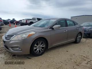 2013 Hyundai Azera z VIN KMHFG4JG5DA254372, wystawiony jako Copart lot #55731895 z przebiegiem 116 549 mil mil oraz Czysty tytuł • Clean title. Historia ofert i sprzedaży dostępna na DreamBid. Obrazek 1.
