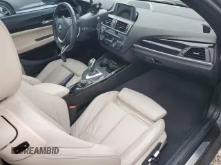 2017 BMW 2 Series 230i with VIN WBA2F9C52HV664153, listed as a Copart auction lot 51953875 with 71,904 mi miles and Salvage title. Bid and sale history available at DreamBid. Image 8.