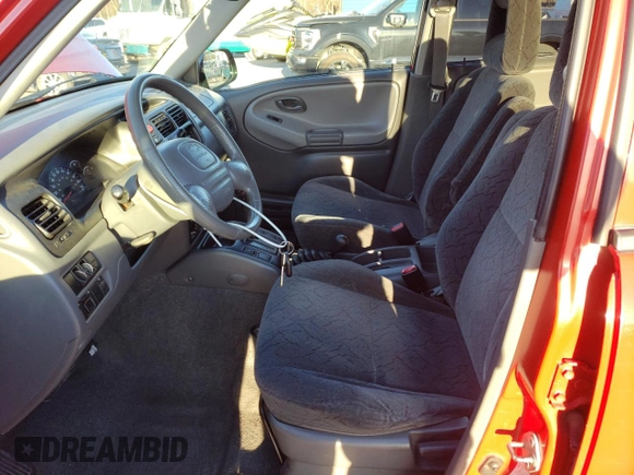 2003 Chevrolet Tracker ZR2 z VIN 2CNBJ734836926876, wystawiony jako Copart lot #83849804 z przebiegiem 198 674 mil mil oraz Szkoda całkowita • Salvage title. Historia ofert i sprzedaży dostępna na DreamBid. Obrazek 7.