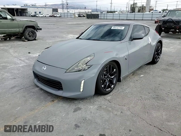 2017 Nissan 370Z с VIN JN1AZ4EH8HM950212, выставлен на аукционе Copart как лот 86412744 с пробегом 34 321 миль миль и Списание • Salvage title. История ставок и продаж доступна на DreamBid. Изображение 11.