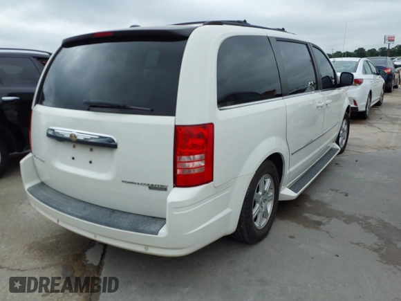 2010 Chrysler Town & Country Touring with VIN 2A4RR5D14AR133746, listed as a IAAI auction lot 42116450 with 221,775 mi miles. Bid and sale history available at carsss.com. Image 4.