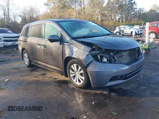 2015 Honda Odyssey EX-L with VIN 5FNRL5H61FB078656, listed as a IAAI auction lot 41212194 with 141,124 mi miles and . Bid and sale history available at carsss.com. Image 1.