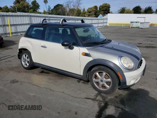 2010 MINI Hardtop with VIN WMWMF3C57ATU77370, listed as a Copart auction lot 50078605 with 187,187 mi miles and Salvage title. Bid and sale history available at DreamBid. Image 4.