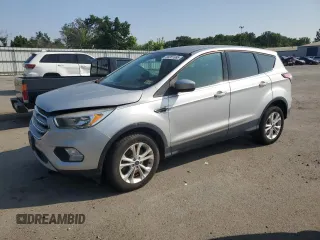 2017 Ford Escape SE z VIN 1FMCU9G99HUF01057, wystawiony jako Copart lot #60351695 z przebiegiem Nie podano mil oraz Czysty tytuł • Clean title. Historia ofert i sprzedaży dostępna na DreamBid. Obrazek 1.