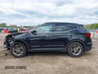 2018 Hyundai Santa Fe 2.4L z VIN 5NMZUDLB2JH058032, wystawiony jako IAAI lot #42206116 z przebiegiem 138 688 mil mil oraz . Historia ofert i sprzedaży dostępna na DreamBid. Obrazek 15.