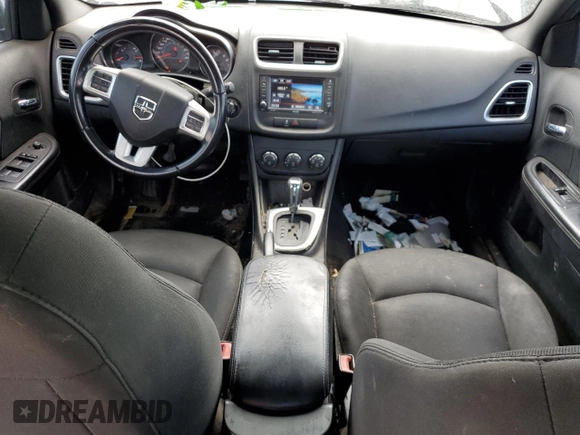 2013 Dodge Avenger SXT with VIN 1C3CDZCB5DN702864, listed as a Copart auction lot 59860115 with 168,087 mi miles and Salvage title. Bid and sale history available at DreamBid. Image 8.