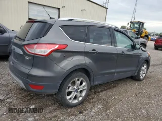 2015 Ford Escape Titanium with VIN 1FMCU9J96FUB32972, listed as a Copart auction lot 62886145 with 215,769 mi miles and Salvage title. Bid and sale history available at DreamBid. Image 3.