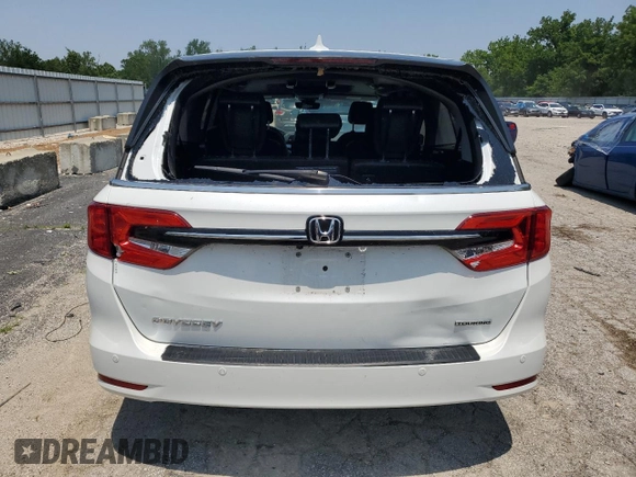 2023 Honda Odyssey Touring with VIN 5FNRL6H84PB016614, listed as a Copart auction lot 59336585 with 36,932 mi miles and Salvage title. Bid and sale history available at DreamBid. Image 6.
