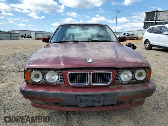 1995 BMW 5 Series 525i z VIN WBAHD632XSGK86387, wystawiony jako Copart lot #58245795 z przebiegiem 168 925 mil mil oraz Czysty tytuł • Clean title. Historia ofert i sprzedaży dostępna na DreamBid. Obrazek 5.