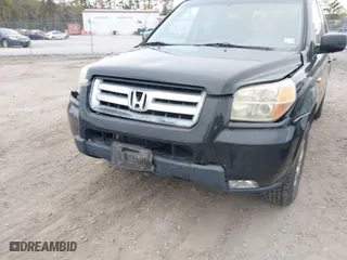2007 Honda Pilot EX-L with VIN 2HKYF18517H513293, listed as a IAAI auction lot 41957031 with 264,875 mi miles. Bid and sale history available at carsss.com. Image 6.
