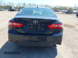 2020 Toyota Camry LE with VIN 4T1C11AK9LU387012, listed as a IAAI auction lot 42103647 with 64,049 mi miles and . Bid and sale history available at carsss.com. Image 17.