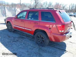 2009 Jeep Grand Cherokee Limited with VIN 1J8HR58P69C553747, listed as a IAAI auction lot 41860865 with 169,841 mi miles. Bid and sale history available at carsss.com. Image 3.