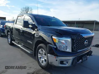 2017 Nissan Titan SL with VIN 1N6AA1E69HN552760, listed as a IAAI auction lot 41266728 with 115,323 mi miles and . Bid and sale history available at DreamBid. Image 1.