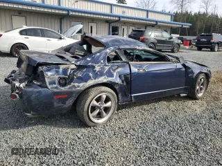 2003 Ford Mustang GT Deluxe with VIN 1FAFP42X23F321777, listed as a Copart auction lot 45707565 with 0 mi miles and Salvage Title. Bid and sale history available at carsss.com. Image 3.