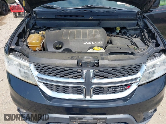 2012 Dodge Journey SXT with VIN 3C4PDDBG3CT144881, listed as a IAAI auction lot 42844117 with 184,804 mi miles and . Bid and sale history available at DreamBid. Image 10.