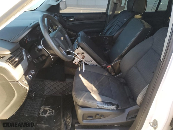 2015 Chevrolet Tahoe Commercial with VIN 1GNSK2ECXFR695889, listed as a Copart auction lot 74369994 with 196,209 mi miles and Salvage Title. Bid and sale history available at carsss.com. Image 7.