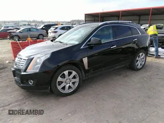 2016 Cadillac SRX Performance Collection z VIN 3GYFNCE32GS505552, wystawiony jako IAAI lot #40949642 z przebiegiem 143 343 mil mil oraz . Historia ofert i sprzedaży dostępna na DreamBid. Obrazek 17.